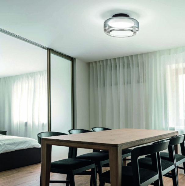 Lampada Ideal Lux installata in ambiente moderno illuminazione diffusa