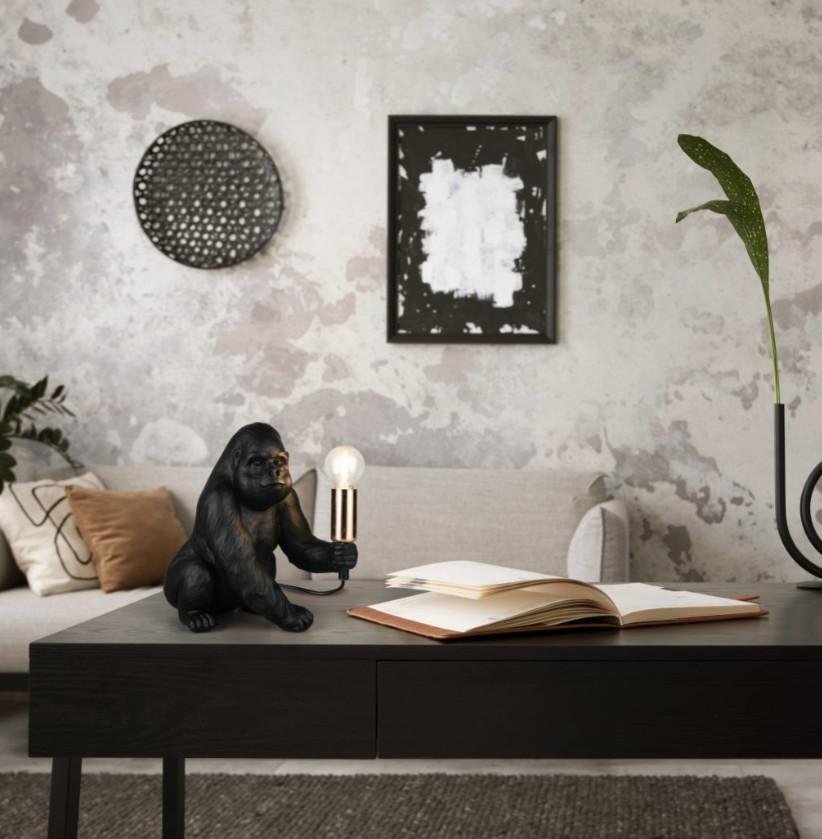 lampada da tavolo gorilla nera su scrivania in ambiente moderno Trio Lighting