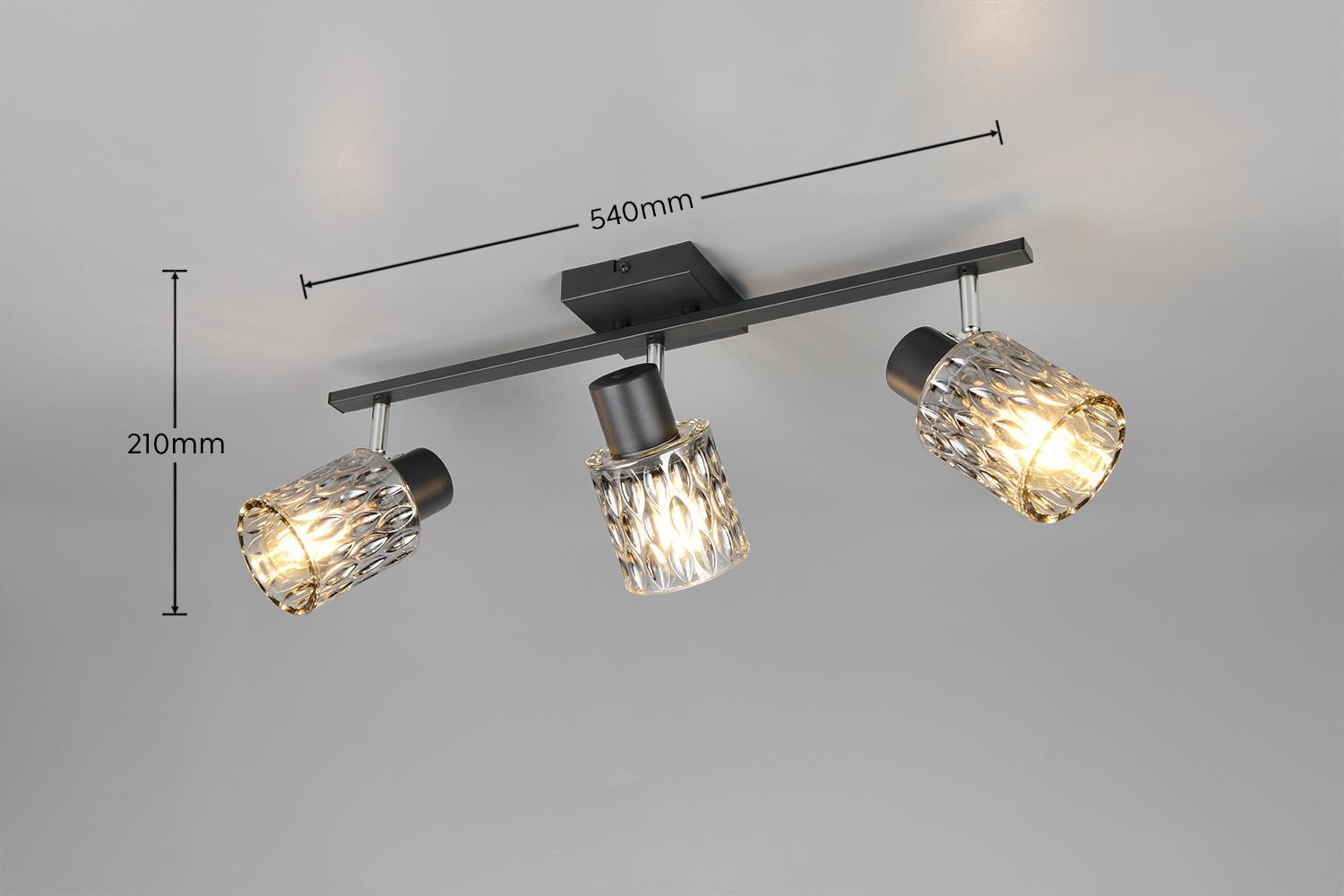 barra faretti orientabili con vetro lavorato fume installata in soggiorno