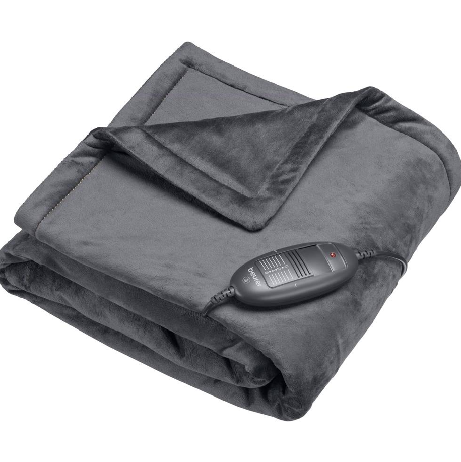 termocoperta riscaldante grigia su divano per comfort termico domestico