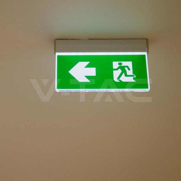 cartello uscita emergenza led installato a soffitto con pittogramma freccia sinistra